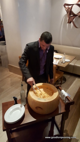Enrico prepares the fettuccini in the hollowed out Parmigiano Reggiano wheel.